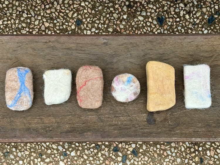Row of six bars of felted soap