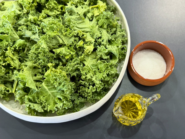 Bowl of kale, olive oil and salt